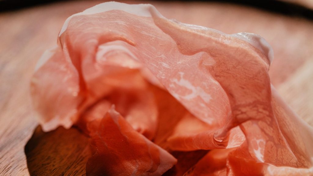 Confezioni del Carpaccio di Prosciutto Devodier nelle versioni Riserva e Light.
